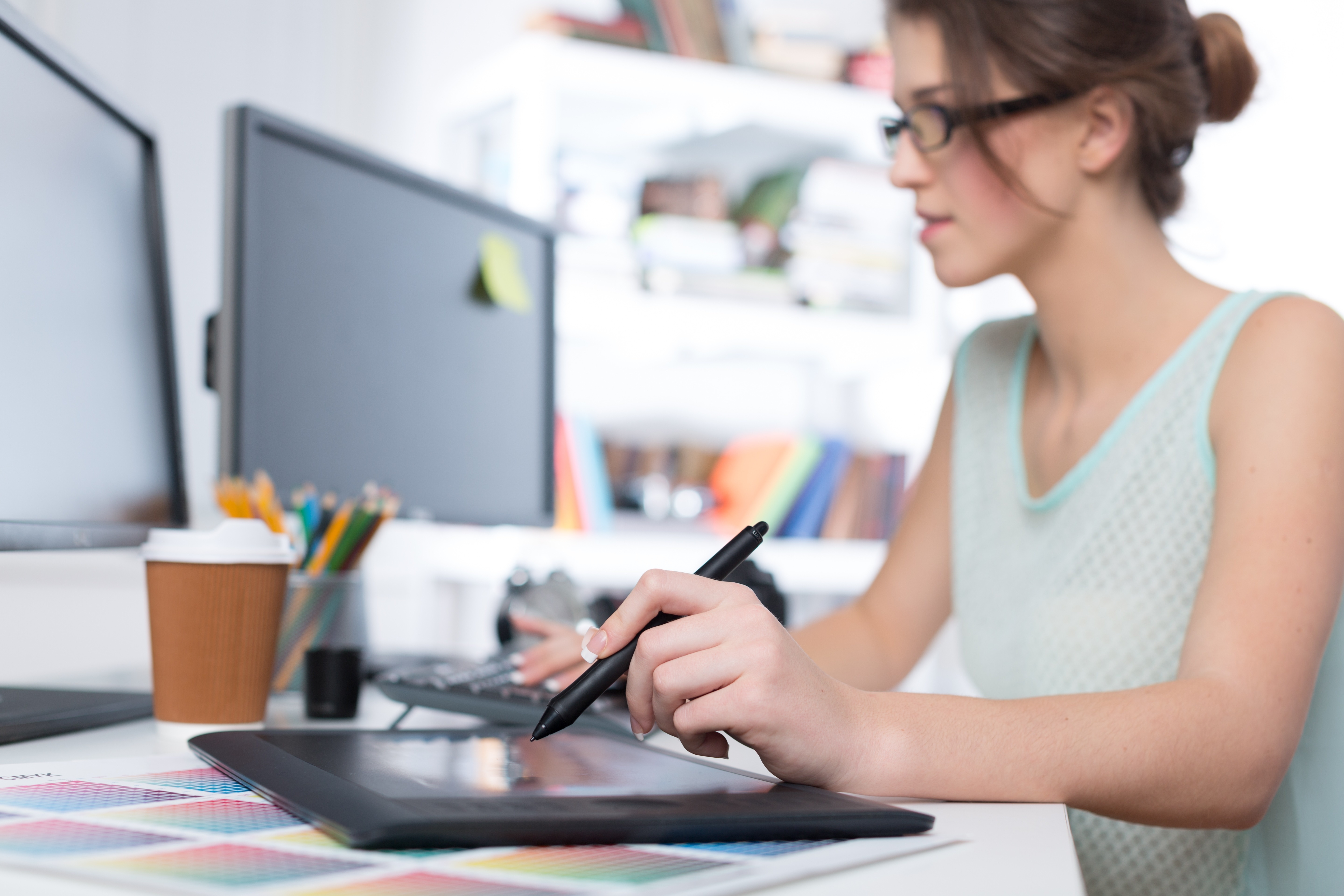 woman editing on computer