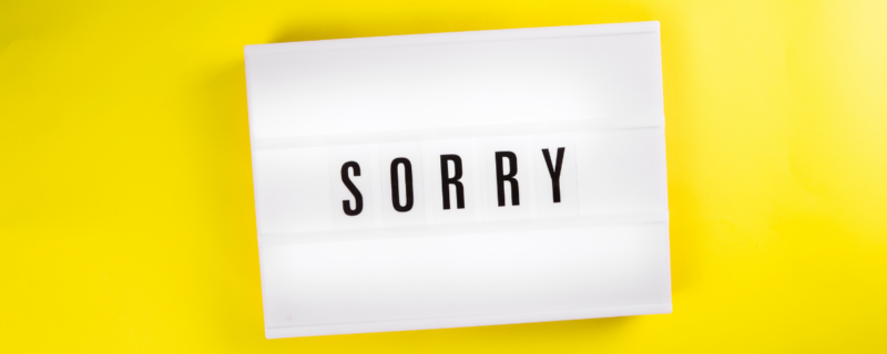 A sign with text that says 'sorry'
